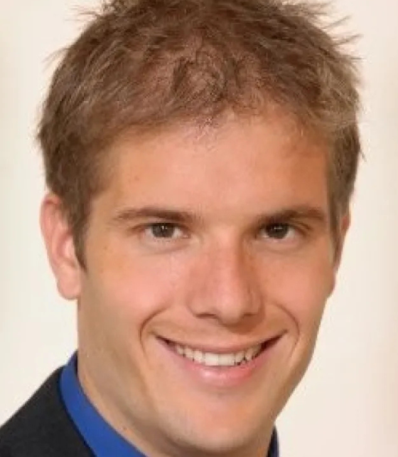 Headshot of Andrew Burgess