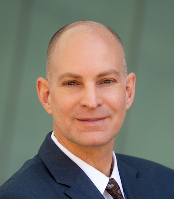 Portrait of Tauber faculty advisor John Branch