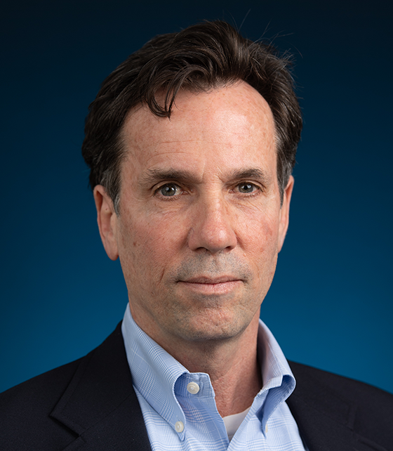 Portrait of Tauber faculty advisor Tom Buchmueller