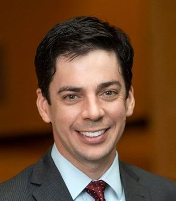 Portrait of Tauber faculty advisor Jim Omartian