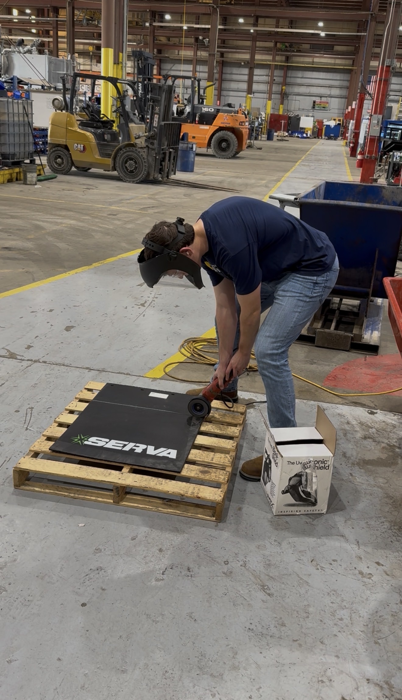 A student works on a manufacturing part